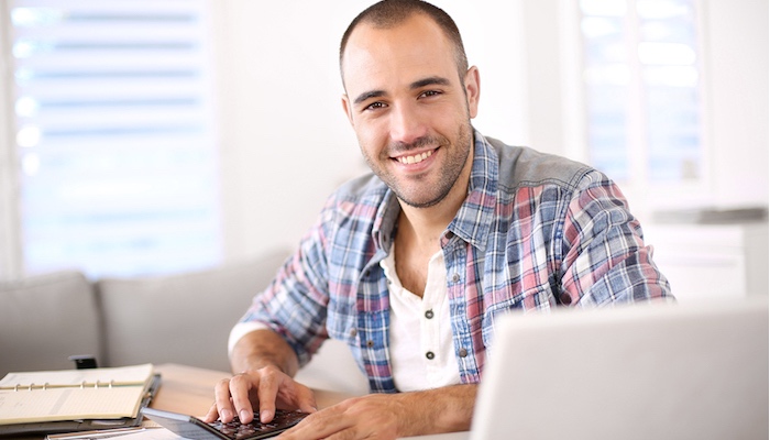 Builder working on computer